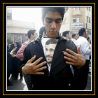  بخش خبري عكس ماه / نفر سوم / یک جوان یزدی که که عکسی از محمود احمدی نژاد را در لباسش گذاشته است / آرش خاموشی / خبرگزاري ایسنا